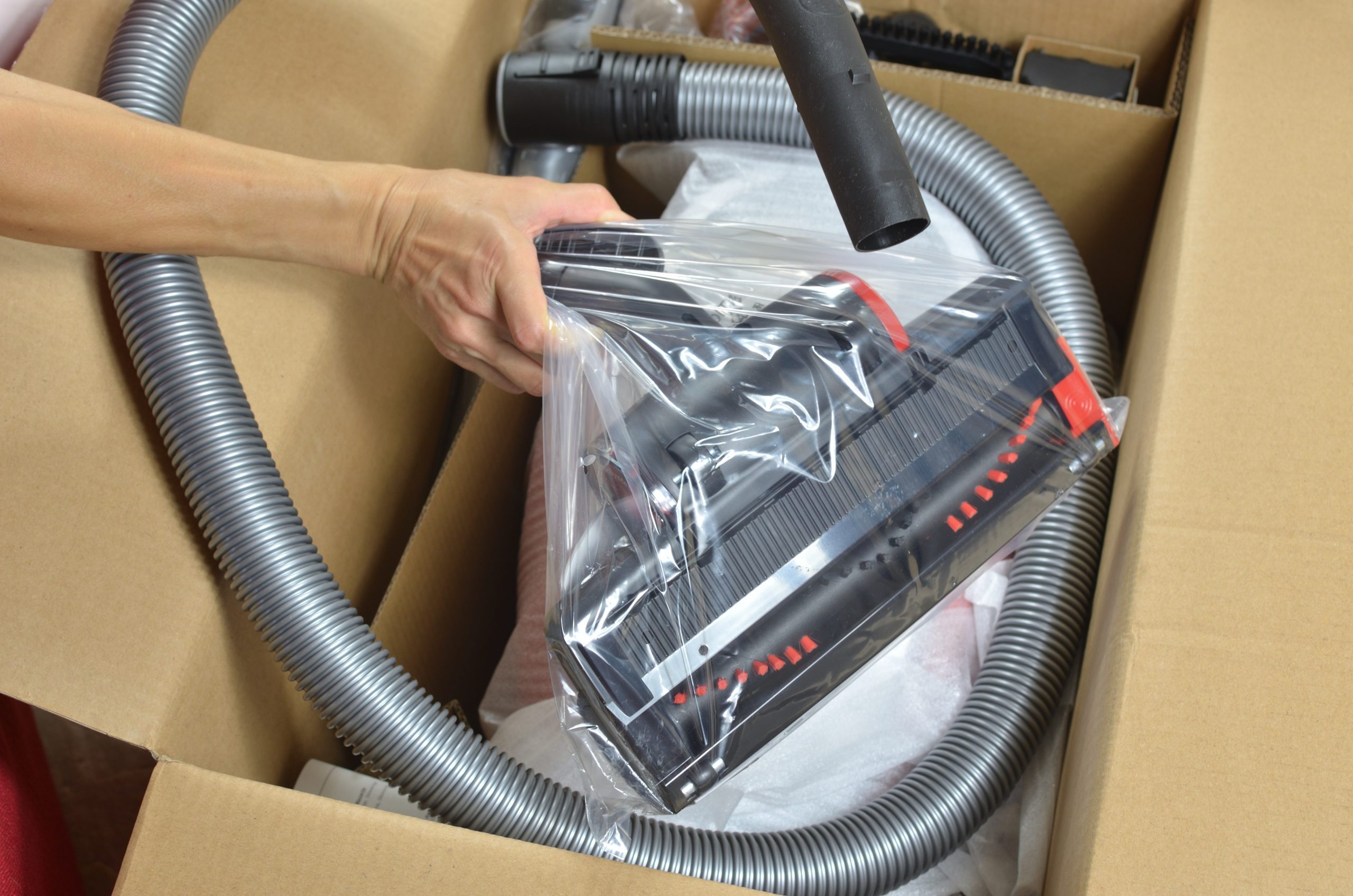 Unboxing a vacuum cleaner and its pro animal brush